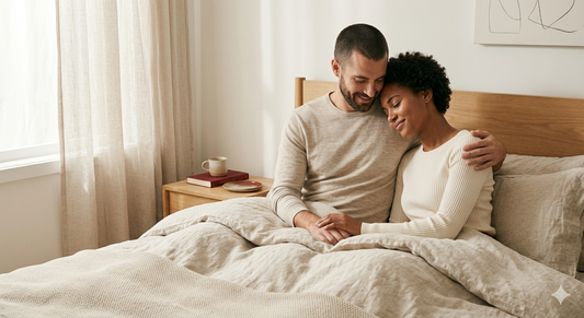 Couple sitting close together representing emotional intimacy and connection.